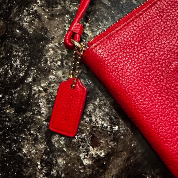 A perfect gift option. Coach Corner Zip Wristlet- Red Pebble Leather - Picture 6 of 7